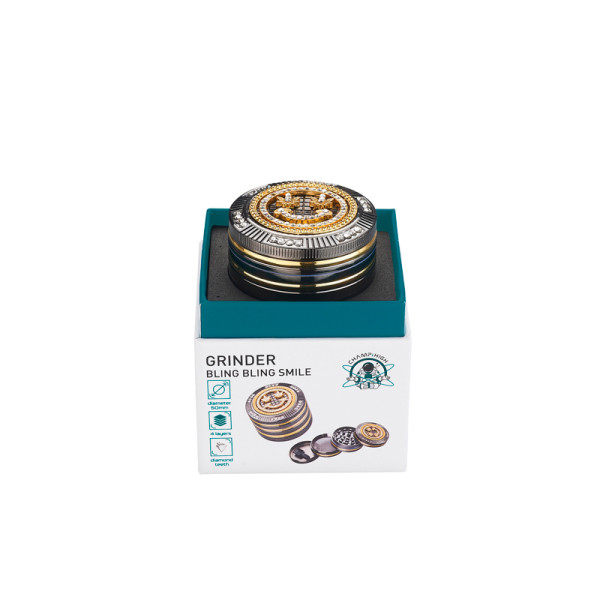 GRINDER METALICO CHAMP BLING YELOWFACE W/LEAF 4 PARTES 5 CM. 1X1